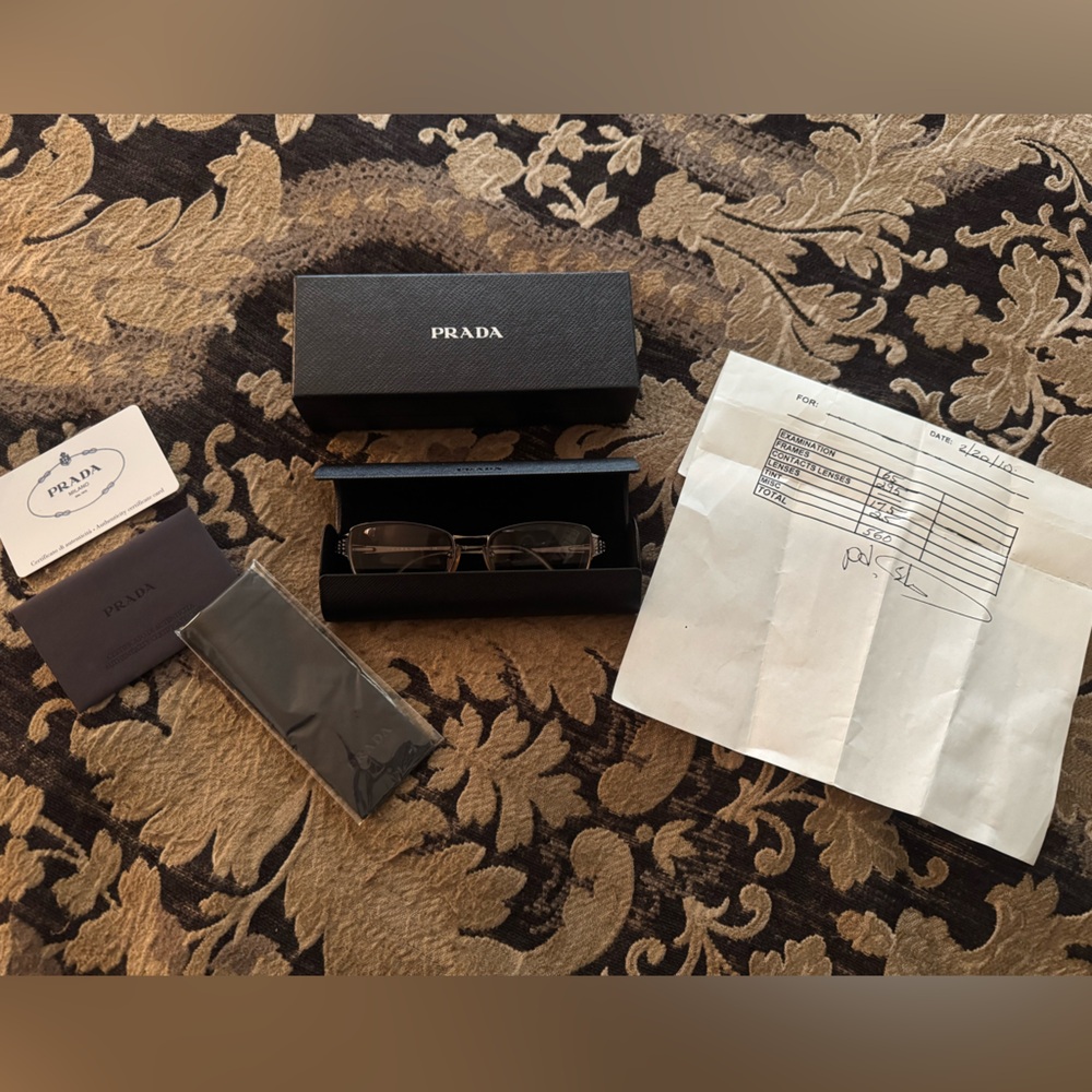 Prada Elegant Gunmetal Eyewear with Case